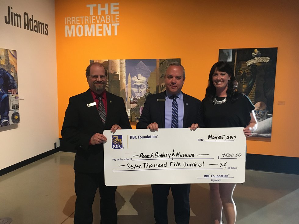 Grant cheque presentation at The Reach Gallery Museum Abbotsford featuring (l-r): Jason Epp, Branch Manager, RBC Royal Bank Sevenoaks, Jeff Starchuk, Branch Manager RBC Royal Bank Clearbrook, Laura Schneider, Executive Director &amp; Curator, The Reach