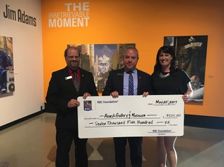 Grant cheque presentation at The Reach Gallery Museum Abbotsford featuring (l-r): Jason Epp, Branch Manager, RBC Royal Bank Sevenoaks, Jeff Starchuk, Branch Manager RBC Royal Bank Clearbrook, Laura Schneider, Executive Director &amp; Curator, The Reach