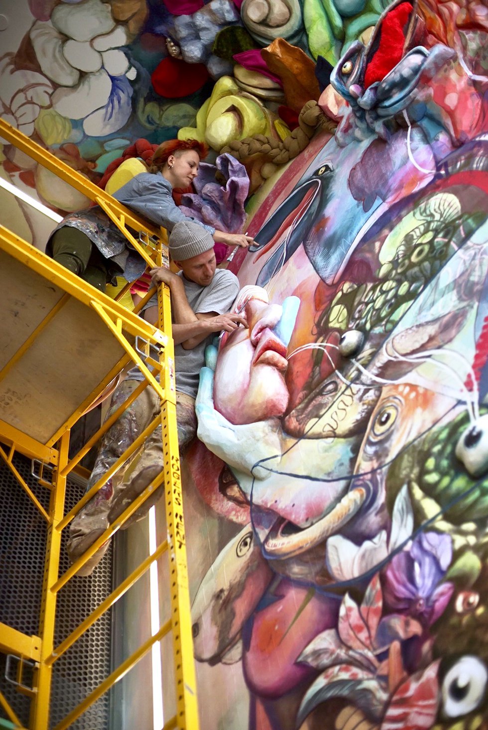 Daniel Kirk and Katie Green paint a mural at cSPACE earlier this year