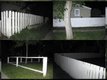 "White Fence at Night"