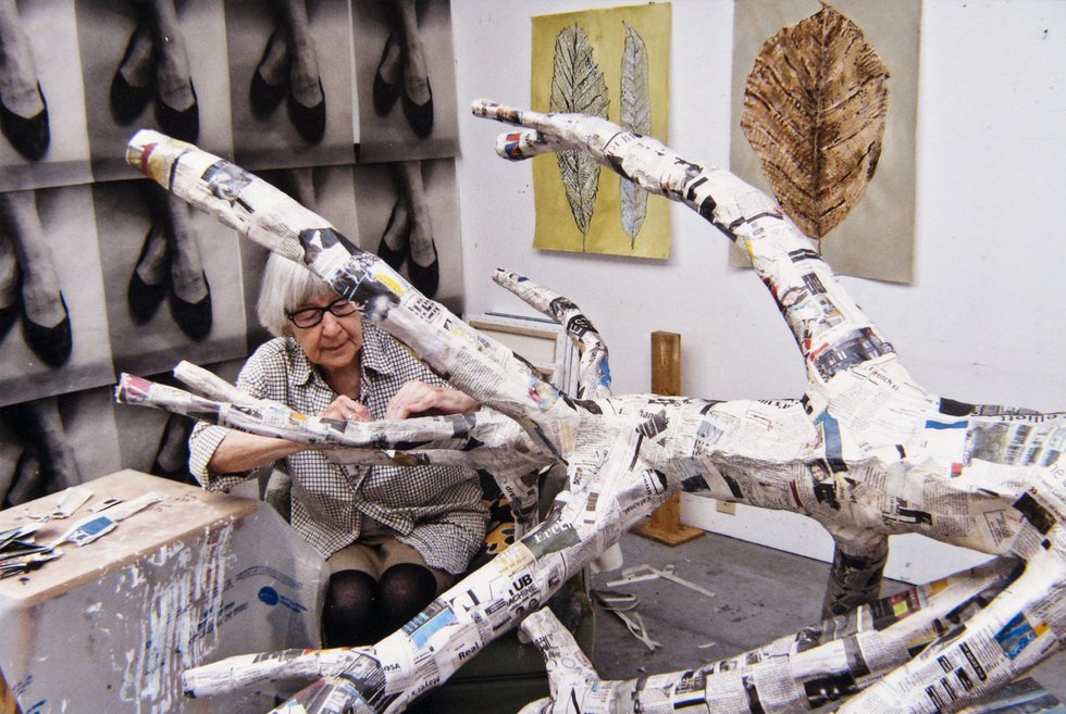 Gathie Falk works on “Winter Tree” in her studio in 2012. (photo by Scott Massey)