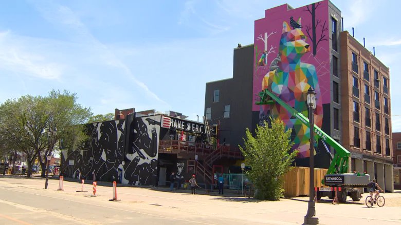Mural designed by Spanish street artist Okuda San Miguel on the north wall of the Crawford Block in Old Strathcona (courtesy CBC News)