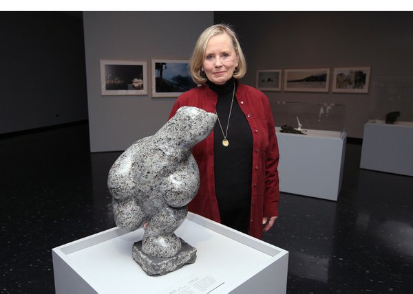 Mrs. Louise Leatherdale stands with Elias Semigak's "Dancing Bear," 2014 after announcing a gift of $1 million to the Winnipeg Art Gallery's Inuit Art Centre on behalf of herself and her late husband, Doug Leatherdale.
