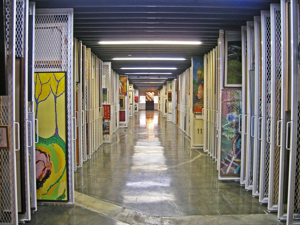 Art stored on racks at the Canada Council Art Bank.