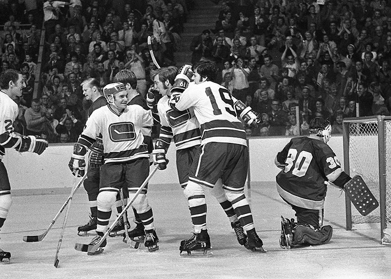Celebrating the first goal by the new NHL 1970 Vancouver Canucks team. The goal was scored by #4 Barry Wilkins