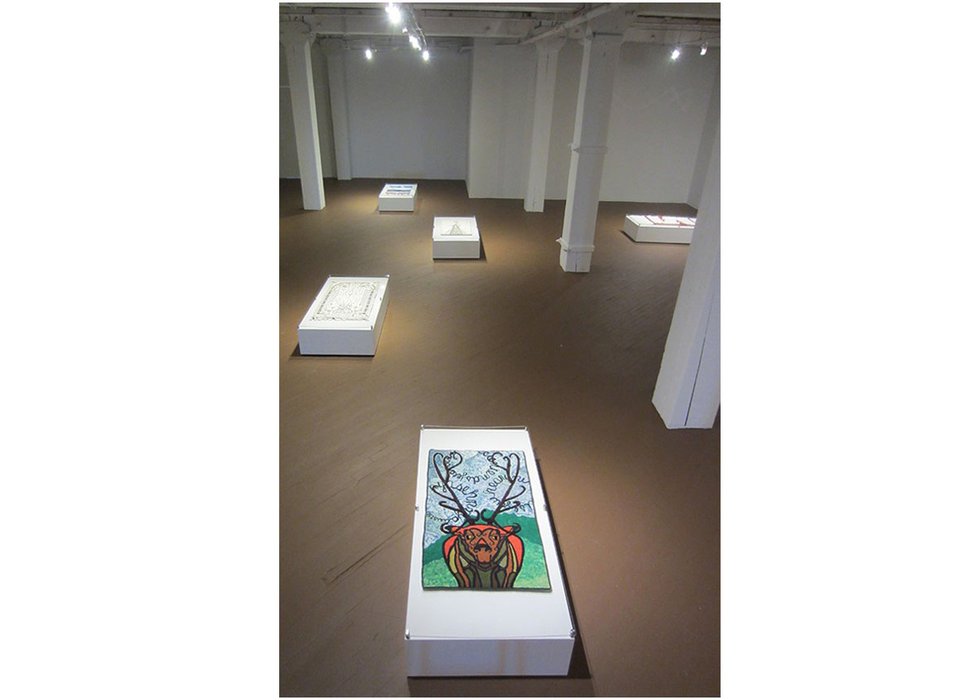Exhibition view of “Weaving Cultural Identities,” showing in foreground “Dialogues of Spirit,” 2018