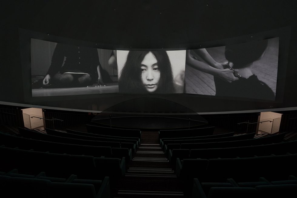 Yoko Ono, “Growing Freedom,” three-channel film on the art and life of John and Yoko, featuring footage of “Cut Piece,” 1964