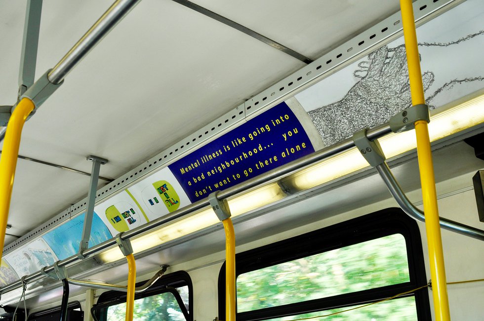 Artworks made by community participants, here including Kaj Korvela and Troy Farrar, were displayed in Calgary’s transit system. (photo by Dick Averns)