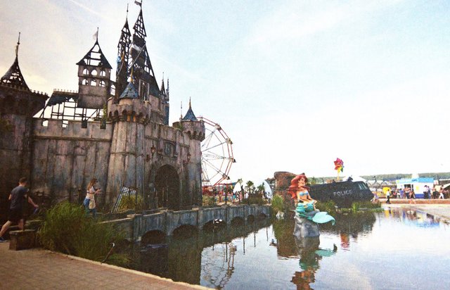 Detail from "A Visual Protest: The Art of Banksy," showing his 2015 project, "Dismaland."