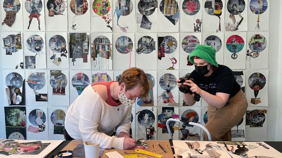 Gabrille Moore (green hat) documents artist Anne Steves as she works on her collage project "A Sense of Adandon / But Not a Lack of Discipline," 2021