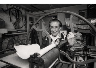 Louise Bourgeois at the printing press in the lower level of her home and studio on 20th Street