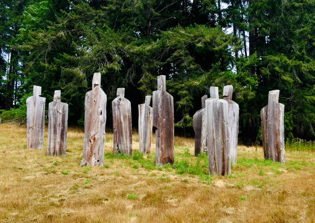 Michael Dennis, “Council of Elders," 2012, red cedar, installation view on Salt Spring Island, B.C. (photo by Portia Priegert)