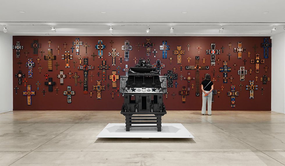 Installation view of Jan Wade’s “Spirit House,” 2021 (foreground) and “Epiphany,” 1990-2021