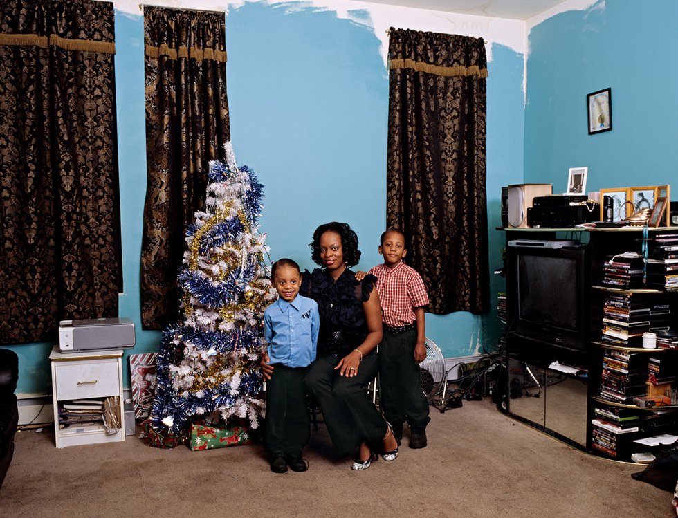 Deana Lawson, "Coulson Family," 2008, from "As We Rise: Photography Rise: Photography from the Black Atlantic" (Aperture, 2021) © Deana Lawson, courtesy Sikkema Jenkins &amp; Co., New York