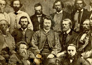 Louis Riel (centre) and his provisional government. (Courtesy the University of Manitoba Archives &amp; Special Collections