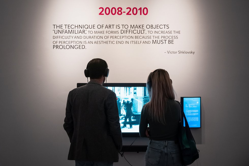 Visitors interacting with a videopoem in Poets with a Video Camera.