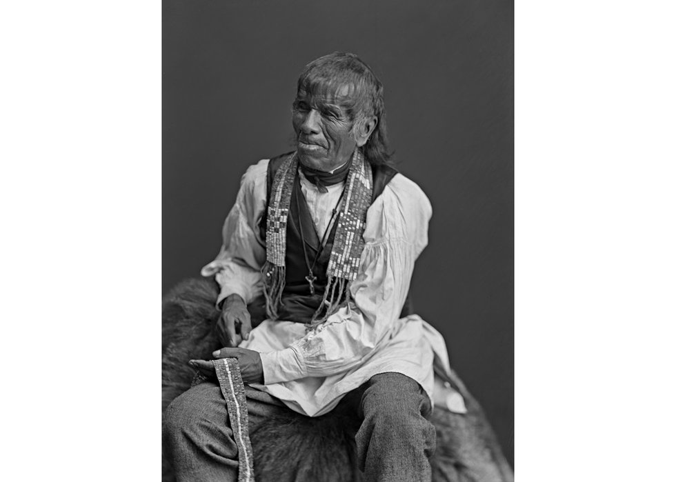 Onondaga chief Isaac Hill Kaweneseronton of the Six Nations Confederacy with a wampum in his hand and another around his neck, William Notman, wet collodion negative, 1870