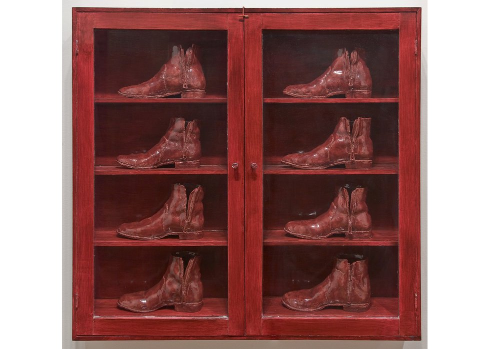 Gathie Falk, “Eight Red Boots,” 1973, red-glazed ceramic in painted plywood and glass cabinet, 40" x 42" x 6” (photo courtesy of National Gallery of Canada © Gathie Falk)