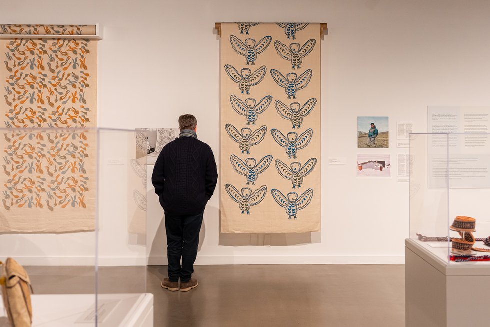 A look at the installation of “ᖃᓪᓗᓈᖅᑕᐃᑦ ᓯᑯᓯᓛᕐᒥᑦ Printed Textiles from Kinngait Studios”  at Glenbow at The Edison (photo courtesy of Glenbow)