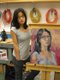 Germaine Koh poses with a version of her ongoing self-portrait in 2006 at the Kelowna Art Gallery.