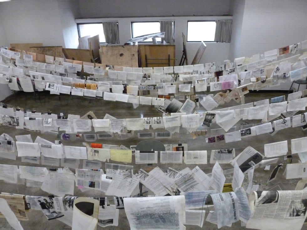 "After the Calgary flood, Stride’s volunteers set documents and other material out to dry as other volunteers worked to repair basement walls"