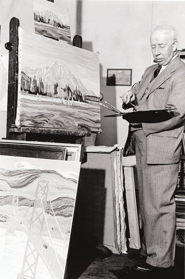 "A.Y. Jackson painting in his Toronto studio"