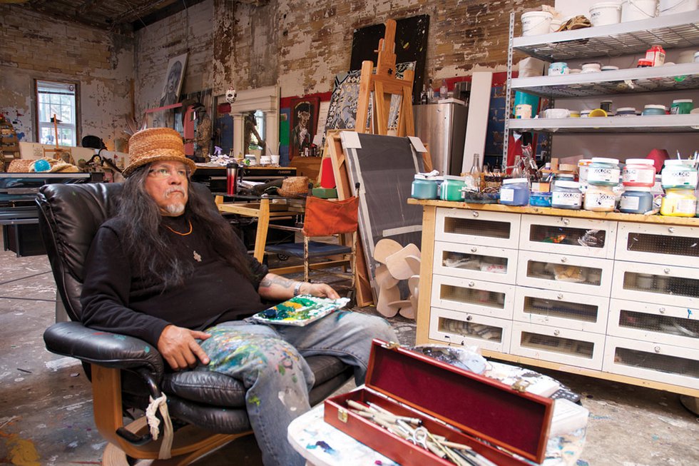 Lawrence Paul Yuxweluptun in his studio (photo by Ken Mayer)