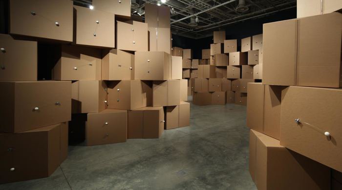 Zimoun, "370 prepared dc-motors, cotton balls, cardboard boxes, 71x71x71cm," 2014