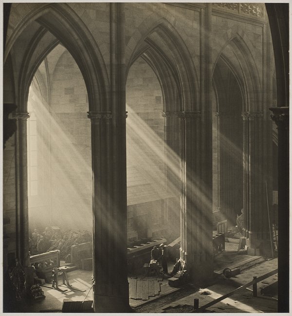 Josef Sudek, "Workers Inside St. Vitus Cathedral, Prague. Shafts of Light Illuminate the Space," 1924-28
